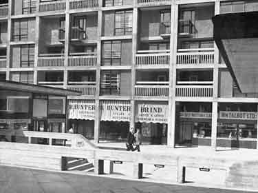 Pavement Shopping Centre showing (l. to r.) Zodiac Coffee Bar, H. Hunter, electrical fittings, cycles and accessories, Brind, ladies and gents outfitters and Wm. Talbot Ltd., butchers