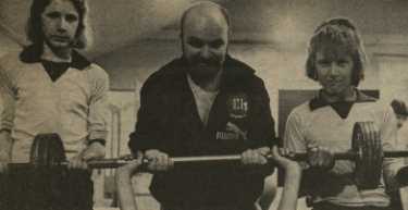 Clive Tempest, senior resources assistant, Audio Visual Aids [Department], Union Road seen here helping to run a weightlifting club, Meynell Road youth club