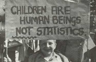 Pickets outside the Town Hall extension protesting against the decision to close 8 city First and Middle schools