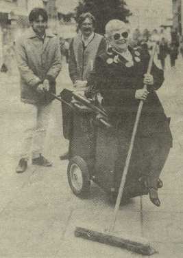 Councillor Phyllis Smith being swept off her feet as she launched the City Council's 'Operation Spring clean', [Fargate]