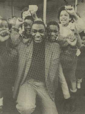 Herol [Bomber] Graham celebrating with the children of Springfield School, Broomhall after opening the the newly refurbished Infant Department