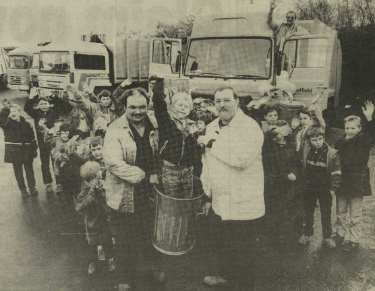 Council binmen Frank Delaney and Paul Parker who have raised funds for Kirkhill School, lift [in dustbin] Mark Hewitt
