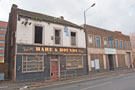 Derelict Hare and Hounds public house No. 27/29, Nursery Street with the Play Resources Centre next door