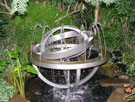 View: a00282 Inner Orbit - Kinetic water sculpture by Pete Rogers, Winter Garden, Surrey Street