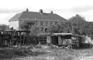 Demolition and rebuilding work, back of houses on Prince of Wales Road from Fairleigh, Manor Estate