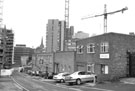 John Osbourne Silversmiths, cutlery manufacturers, Solly Street looking towards Tenter Street with the Metis Building under construction (left)
