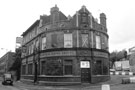 Club Xes (formerly The Norfolk Arms Hotel) Nos. 195 - 199 Carlisle Street (left) at the junction with Gower Street