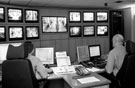 View: c01960 Security officers in the CCTV control room, Meadowhall Shopping Centre