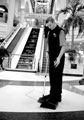 Cleaning Staff with the Escalators leading to the upper level of the Arcade in the background, Meadowhall Shopping Centre, Meadowhall Cleaning Staff with the Escalators leading to the upper level of the Arcade in the background, Meadowhall Shopping Centre, Meadowhall