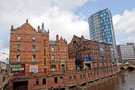 Royal Exchange Flats (left); Castle House; former Hancock and Lant Ltd. premises and IQuarter Apartments and Retail under construction and Park Inn formerly Hotel Bristol (right), Blonk Street from Castlegate looking across the River 