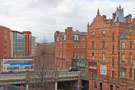View: c03382 Elevated view looking towards the Royal Exchange Flats; Lady's Bridge over the River Don; Royal Victoria Buildings and Irwin Mitchell, solicitors (left) from Castle Market