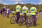 View: c03501 Police officers on bikes in Endcliffe Park during Gay Pride Festival