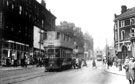 View: s00162 Pinstone Street from Moorhead, showing tram No. 470. Roberts Bros. Ltd., Rockingham House, left, Nelson Hotel, right