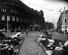 Leopold Street, taken from Town Hall Square Rockery. Premises on left include Nos. 66, 68 and 70, Leopold Street, A. Wilson Peck and Co. Ltd., Music Shop, The Grand Hotel and Education Committee Offices (in background)