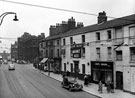 View: s00169 Leopold Street, premises include No. 55 Three Tuns public house, No. 57 Kate Saxon, gown specialist, former Assay Office in background