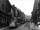 Dixon Lane looking towards Haymarket, including No. 26 Norfolk Arms public house and No. 20 Rock Tavern, on left, Norfolk Market Hall, right