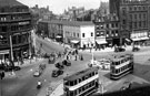 View: s00197 Town Hall Square, elevated view, looking towards Leopold Street and Fargate, right. Nos. 66 - 70 Leopold Street, A. Wilson Peck and Co. Ltd., music warehouse, left. Premises on Fargate include No. 70 H.L. Brown and Son Ltd., jewellers