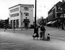 Junction of London Road and Cemetery Road from The Moor. Nos. 2 - 4 London Road, showing the new Barclay's Bank, Sheffield and Ecclesall Co-operative Society, The Arcade in background