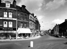 General view of The Moor from junction with Ecclesall Road (left) and St. Mary's Gate (right). Premises include No. 206 Yorkshire Bank Ltd., No. 210 Home Farm Products Ltd., butchers, No. 2 Ecclesall Road, Henry Playfair Ltd., shoe hop