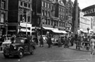 View: s00319 Fargate from High Street. Shops include No. 9 Austin Reed Ltd., mens outfitters, Nos. 11 - 15 Goldsmith's Chambers (premises include No. 11 Sheffield Goldsmith's Co. Ltd., No. 13 John Thorpe Ltd., restaurant, No. 15 Alexandre Ltd., tailors