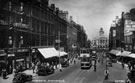 Fargate looking towards High Street and Kemsley House, Fargate including Nos. 42 - 46 Winchester House and Nos. 38 - 40 Arthur Davy and Sons, provision dealers, Davy's Building, left
