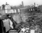 View: s01101 Forncett Street showing air raid damage to Motor Body Building Co. Ltd.
