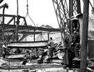 Demolition of steel-built building after air raid