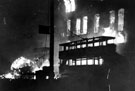 Burning tram in High Street, during air raids, World War II