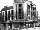 Montague Burton, tailors, Angel Street, showing air raid damage, King Street, left