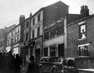 Norfolk Street below Change Alley, showing air raid damage