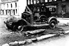 Wrecked car in Porter Street, after air raids