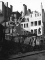 Site of E. Weston and Co., newsagents, Change Alley, showing air raid damage
