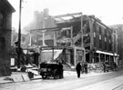 Shops in West Street, below Inland Revenue Buildings, air raid damage