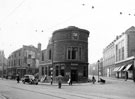 Junction of London Road (left) and Cemetery Road (right) showing air raid damage, Barclays Bank on corner, Sheffield and Ecclesall Co-operative Society (The Arcade) on right
