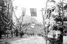 Decorations for Queen Victoria's visit. Looking up High Street towards Cole Brothers
