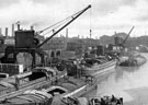 Sheffield Canal Basin showing the steam cranes used in loading the barges