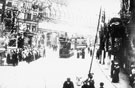 High Street at junction with Market Place, showing decorations for Queen Victoria's visit