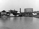 View: s01666 Sheffield Canal Basin showing Effingham Street gas holder, Railway Bridge and Sheaf Works (later to become Sheaf Quay pub)