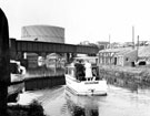 View: s01674 Motor cruiser 'Denrodawn' Sheffield Canal Basin with Park Station bridge and Effingham Street gas holder in the background