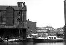 Sheffield Canal Basin showing derelict Grain Warehouse and motor cruisers including  'Francena'