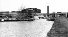 Sheffield Canal Basin showing Railway Bridge and Sheaf Works (later to become Sheaf Quay pub) and various craft including the 'Corrie'