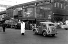 Castlefolds wholesale fruit and vegetable market, Broad Street, left, Corn Exchange, right