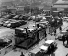 Castlefolds car park (site of former Castlefolds Market) showing (top) W. Ogley, pet store and R.B. Bingham Ltd., provision merchant