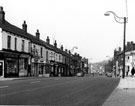 View: s02343 Chesterfield Road, Woodseats including No. 743 Woodseats Hotel, right, No. 764 C.E. Styan Ltd., bakers, No. 762, B. Smith, butcher, No 760, A.E. Gazzard and Sons Ltd., decorators, Nos. 756 - 758, Hy Spencer, chemist