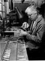 Stan Shaw, cutler, in his workshop, No. 48 Garden Street