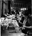 Warehouse staff giving knives a final polish, Mappin and Webb