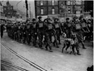 Home Guard anti-aircraft batteries, head a recruiting march through Sheffield. 	