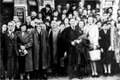 Staff from local cinemas await transport for a days outing, outside the News Theatre, Fitzalan Square
