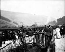 Guests arrive by train for the laying of record stone on the partially constructed Howden Dam by Thomas Gainsford, Chairman of the Derwent Valley Water Board