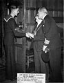 View: s03112 Lord Mayor, Alderman William Ernest Yorke greets Boy Signalman Tyler of Nidd Road with Capt., G.H B. Foulkes